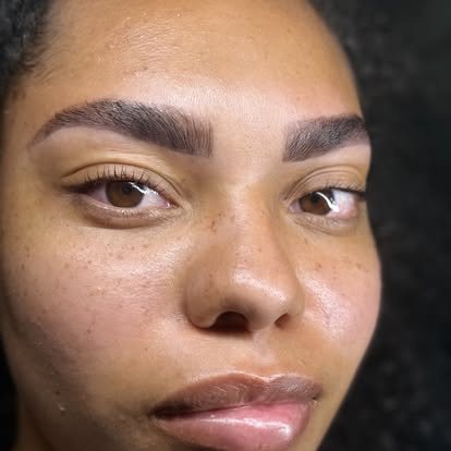 Freshly shaped, defined brows with a natural, glowing complexion