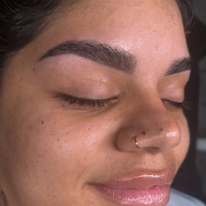 Detailed brow and lash artistry for a clean, defined look