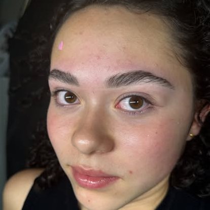 Defined brows and a fresh, dewy complexion